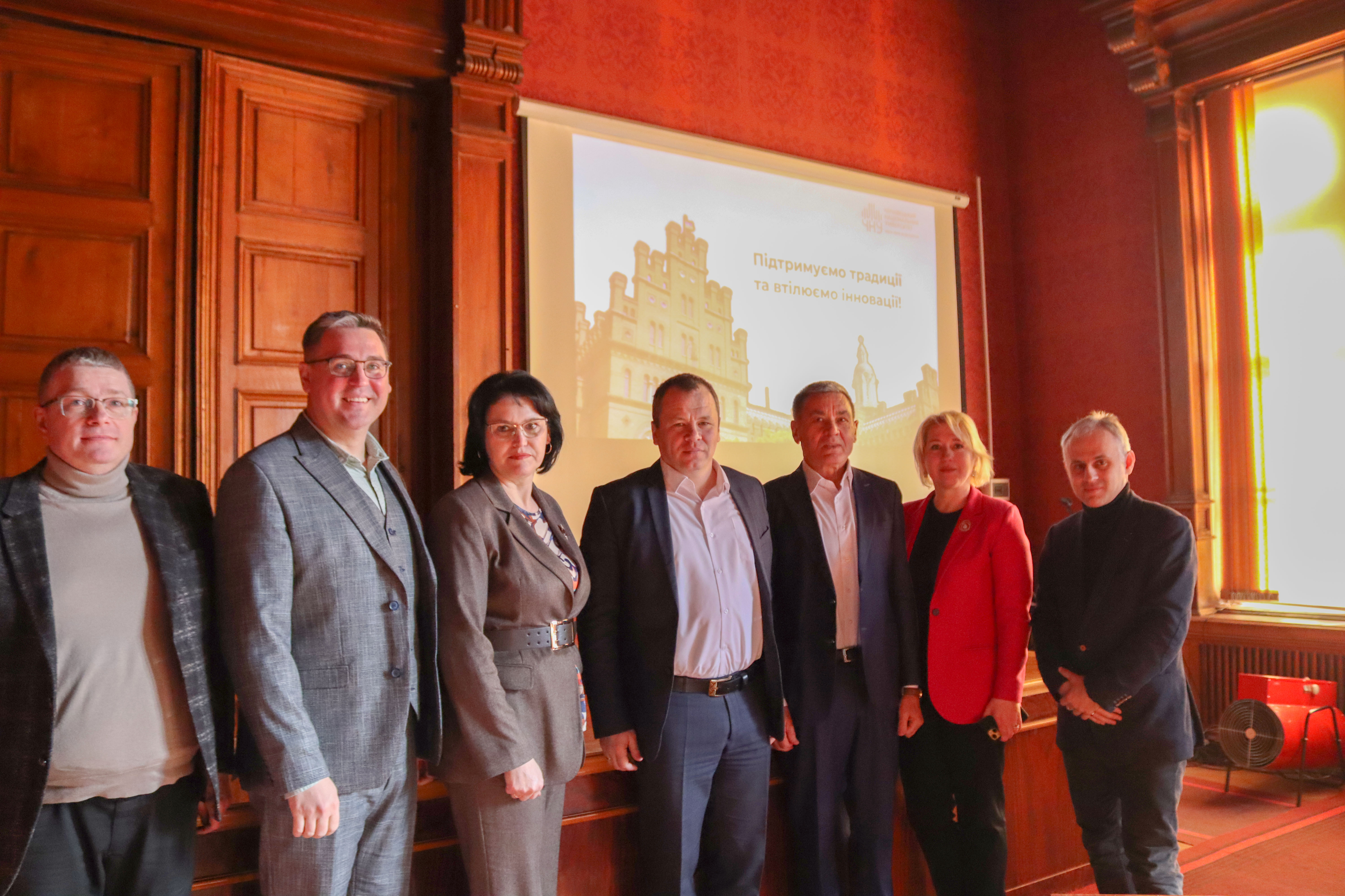 Ректор Руслан Білоскурський з проректорами і попереднім ректором Романом Петришеним